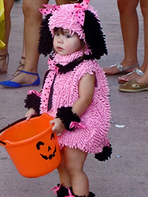 A Girl in a Pink Bug Costume